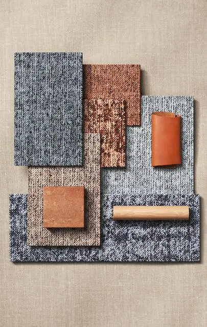 Moodboard met Desso Linon-stalen in blauw, grijs en koper