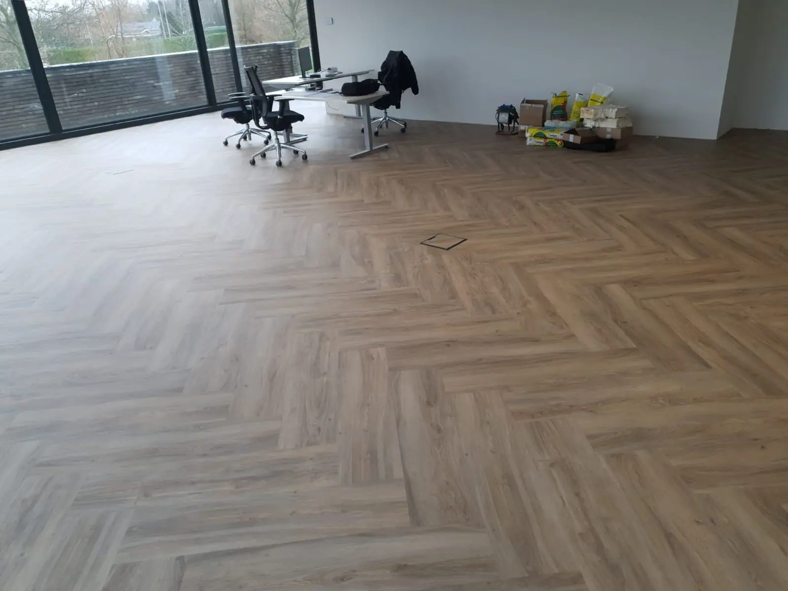 PVC visgraatvloer in een kantoor in Den Bosch